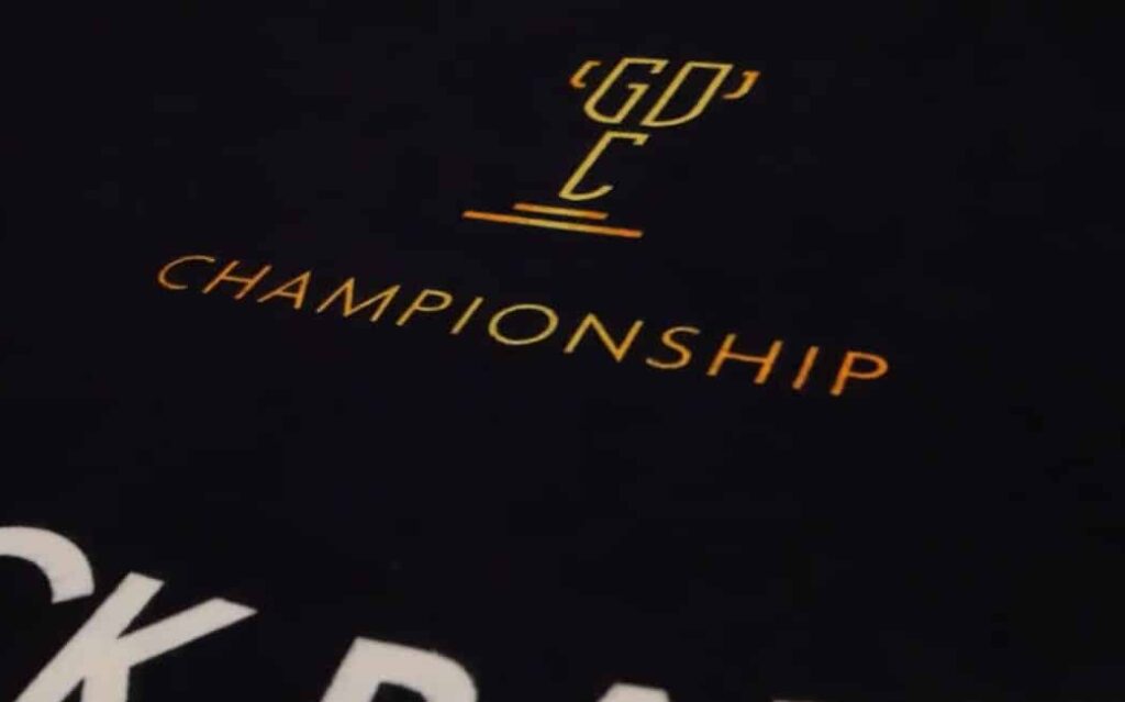Bild des German Dealer Championship-Logos auf einem Casinotisch.