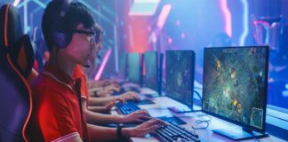 화려한 조명 아래에서 e-스포츠 게임을 즐기는 사람들