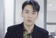 승리, 불법 카지노 운영 연루 의혹 재점화 사무실로 보이는 공간에서 짙은 무늬 재킷을 입은 남성이 카메라를 정면으로 바라보고 있는 모습