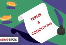 ‘TERMS & CONDITIONS’라는 문구가 적힌 문서가 테이블 위에 펼쳐져 있는 일러스트 이미지. 동전과 깃펜이 함께 배치돼 있으며, 온라인 카지노 이용약관의 중요성을 상징적으로 표현하고 있다.