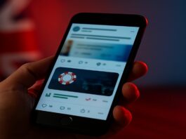 telefoon met gokreclames op social media