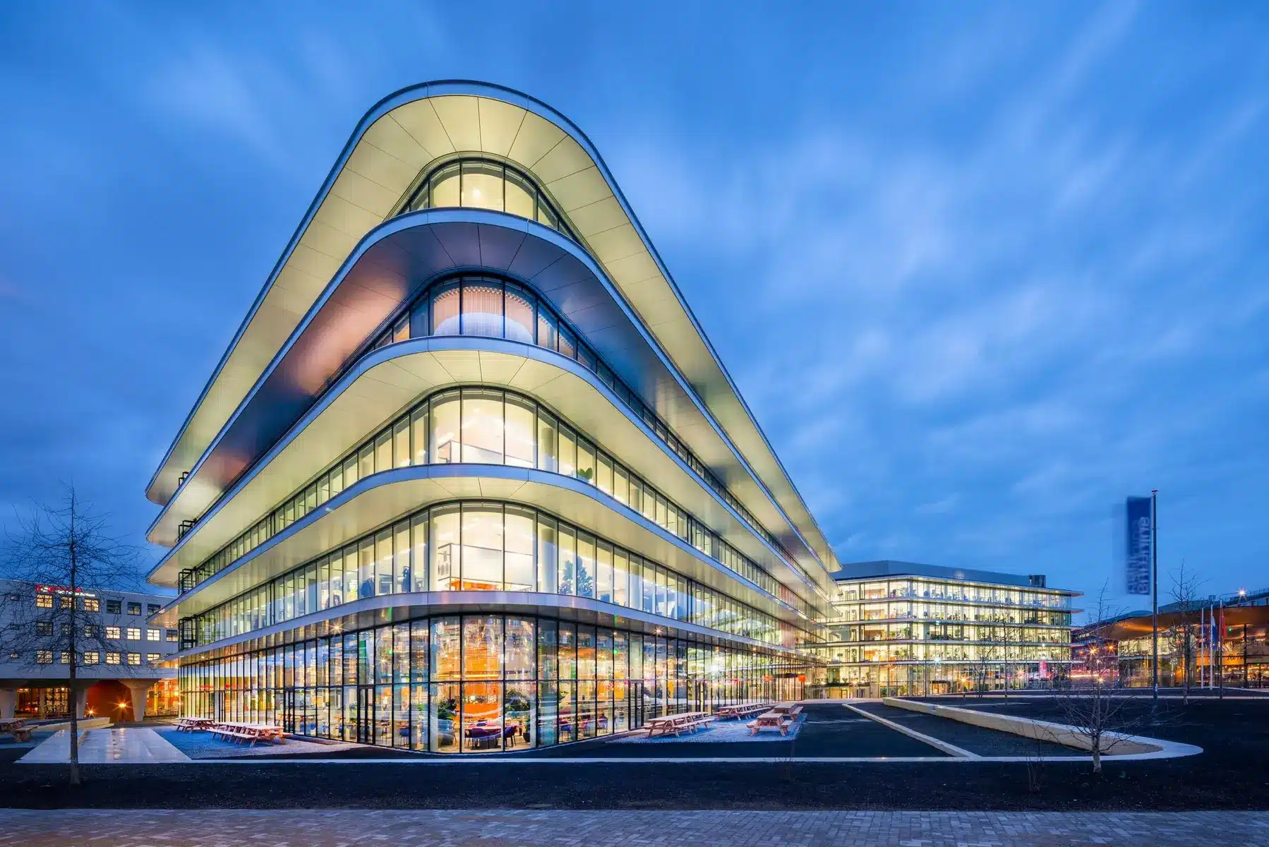 Modern architectural view of the Babylon building in The Hague featuring the Kansspelautoriteit offices.