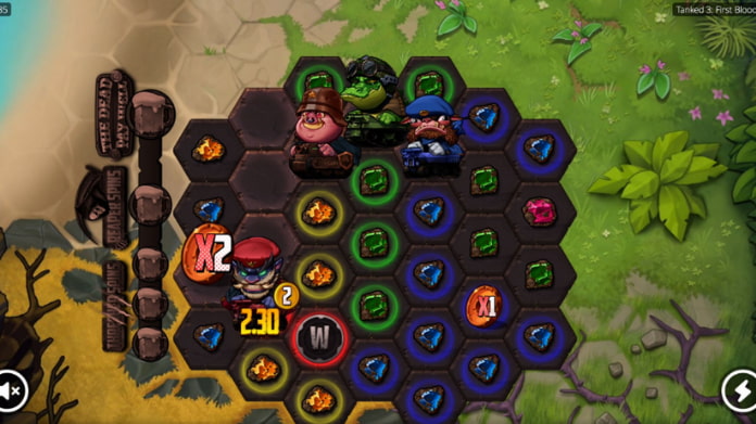 tanked-3 Tre färgglada spelkaraktärer står på ett hexagonalt spelbräde med juveler och poängsymboler mot en grön och gul bakgrund.