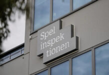 Spelinspektionen stoppar CGG Entertainment Ltd Spelinspektionens logotyp på byggnadsfasad med glasfönster i bakgrunden.