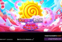 Ny slot från Pragmatic Play: Sugar Rush Super Scatter nu ute Färgglad spelgrafik med godislandskap, spiralformad sol och loggan ”Sugar Rush Super Scatter” i mitten.