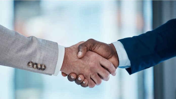 Thank you, welcome and business people in office with handshake for recruitment, deal and hiring negotiation. Job interview, meeting and men shaking hands for b2b agreement, congratulations or offer.