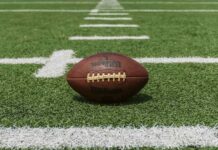 NFL ball on pitch