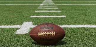 NFL ball on pitch