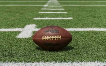 NFL ball on pitch