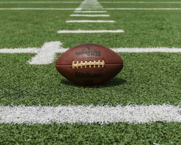 NFL ball on pitch