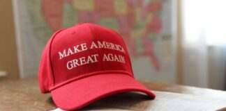 A red make america great again cap