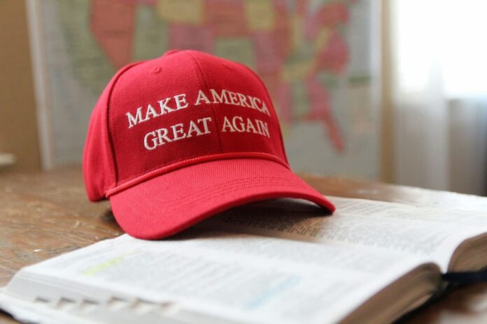 A red make america great again cap