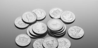 Coins on a grey surface