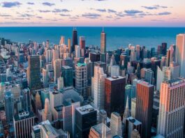 Aerial view of downtown Chicago with Lake Michigan in the background.