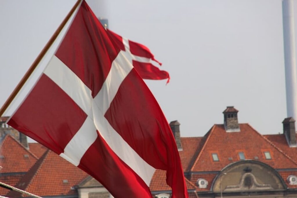 Danish Flag infront of buildings