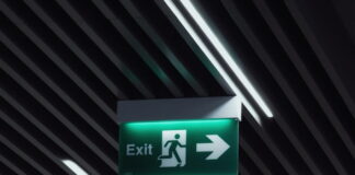 Chumba, Other Sweepstakes Casinos Begin Exiting New Jersey Ahead of Expected Ban Green exit sign with a running figure and arrow, symbolizing departure or exit.