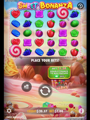 Colorful candy-themed slot machine game interface with various sweets like hearts, grapes, and apples. Bright colors create a playful, cheerful vibe.