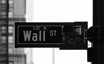 Gaming Stocks Continue to Underperform Amid Economic Worries Wall Street street sign in black and white.