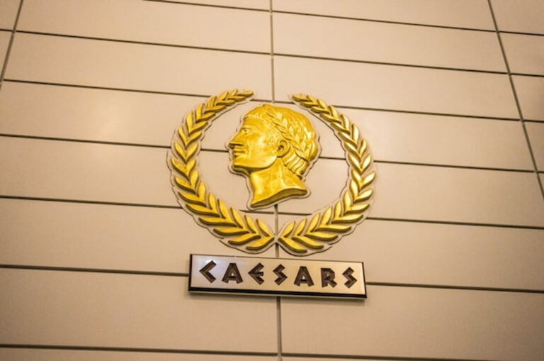 Golden Caesars logo on a wall inside a casino