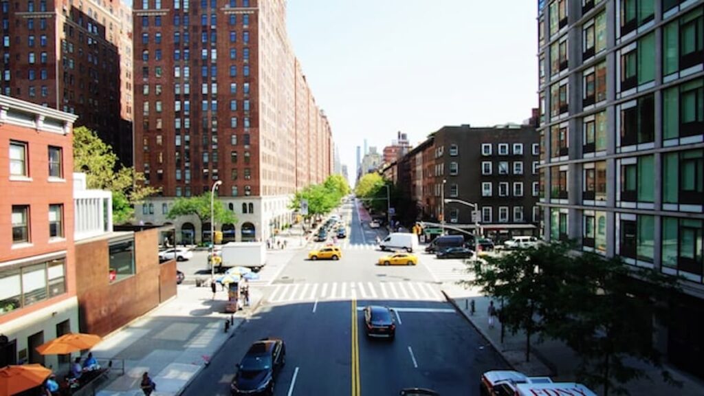 View from the High Line overlooking a busy West Side street in Manhattan.