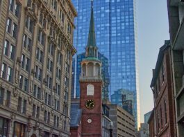 Boston Lawyer Sent to Prison for Embezzling $2M to Fuel Gambling Addiction Historic brick meeting house with clock tower in city center.