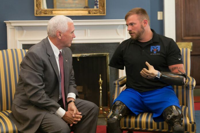 Mike Pence with wounded veteran