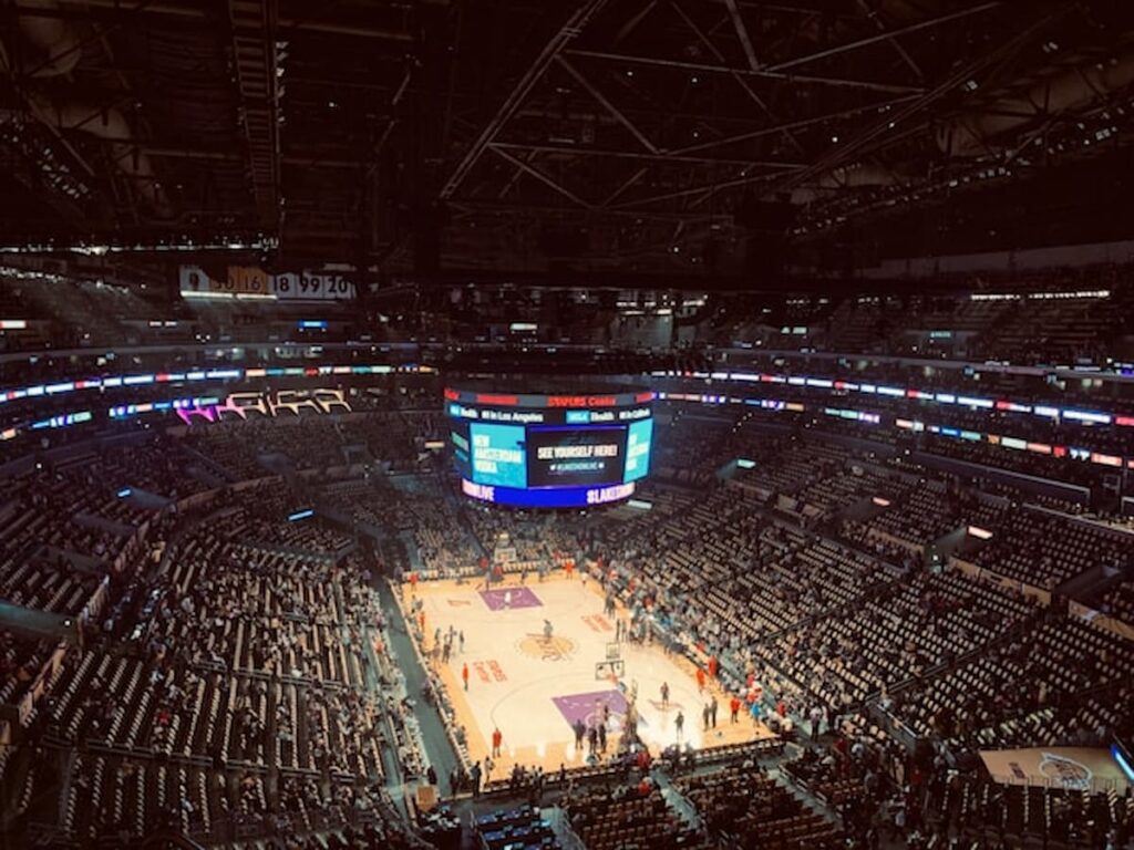 Interior view of a packed NBA basketball arena during a game