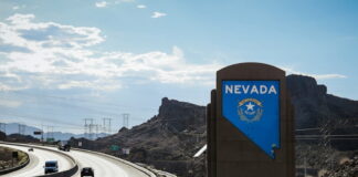 Nevada state welcome sign on highway