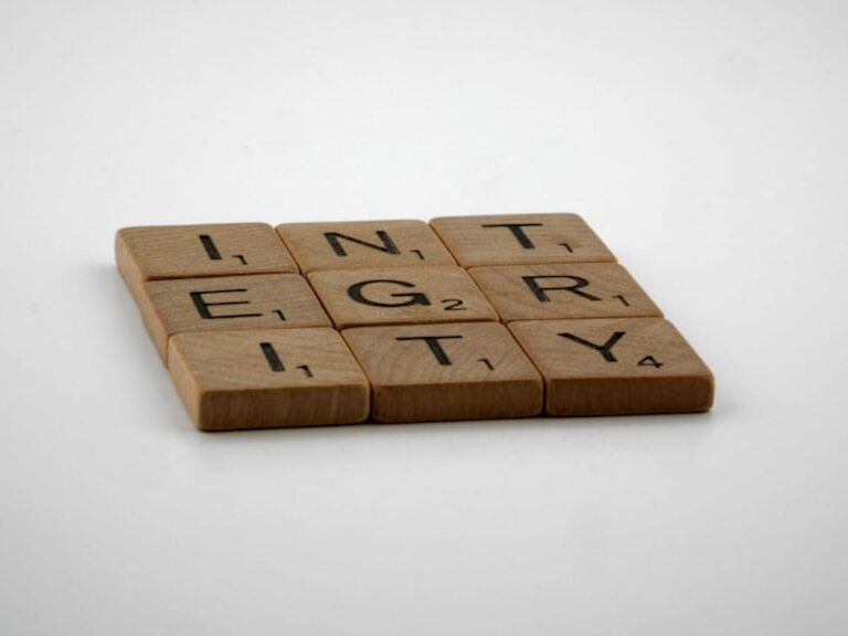Wooden Scrabble tiles spelling the word “Integrity”