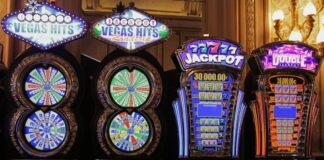 Florida Gambler Hits 389 Jackpots in One Day at Tampa Casino, Winning Over $1.8M Slot machines with jackpot signage and flashing lights inside a casino