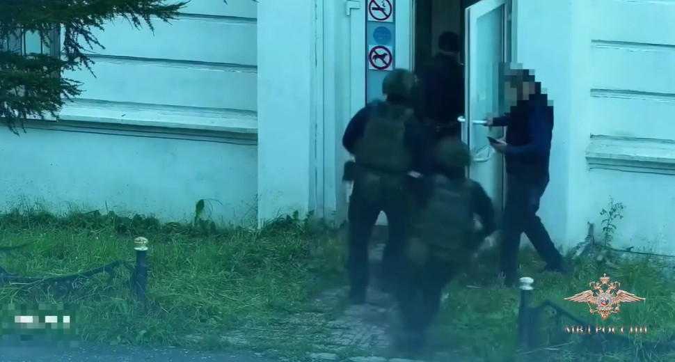 Russian law enforcement agents raid a suspected underground casino in Magadan Oblast this month.