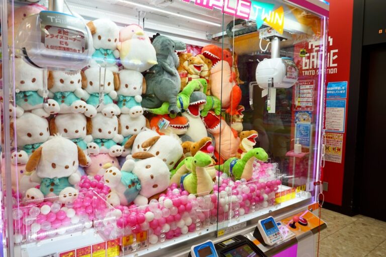 A claw machine filled with various prizes