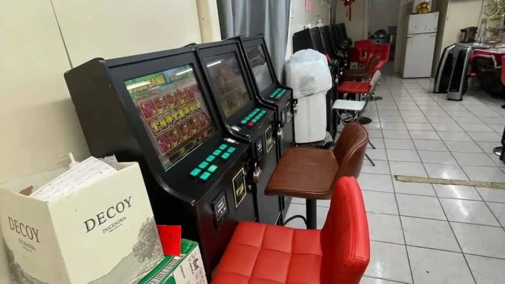 Rows of slot machines and chairs inside an illegal gambling den uncovered by FDNY inspectors in Manhattan