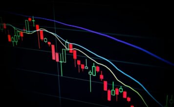 Genius Sports Stock Price Crashes Following Legend Acquisition: Do Investors Need Education? A stock chart moving downwards in trend