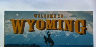 Wyoming Faces Criticism for Investing in Gambling Stocks, Despite Practice Being Commonplace Wyoming sign