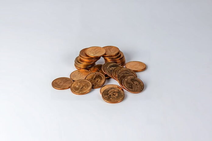 Stack of coins on a white background.