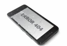Broken smartphone screen displaying “Error 404.”