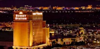 Sunset Station Hotel and Casino illuminated at night in Henderson, Nevada