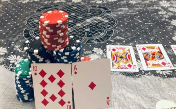 Poker hand and chips