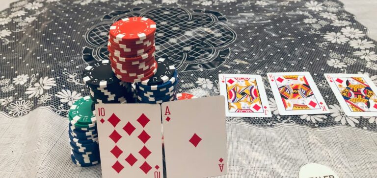 Poker hand and chips