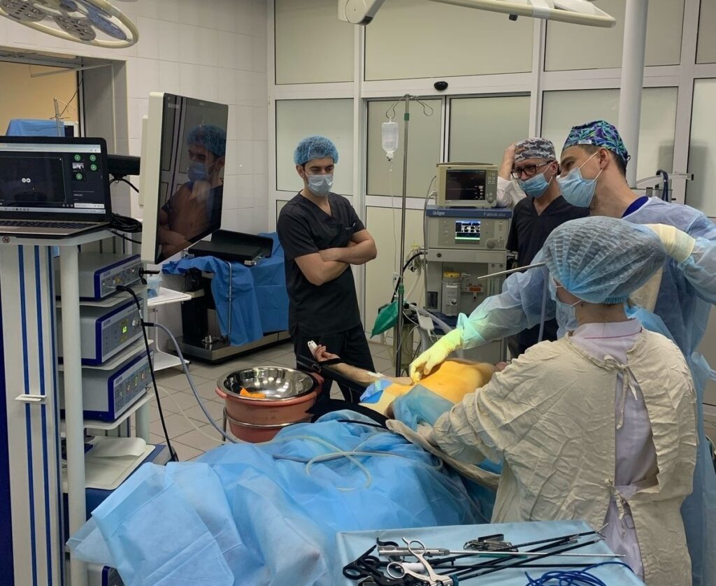 Doctors perform a medical procedure at City Hospital No. 2, in Novosibirsk, Siberia.