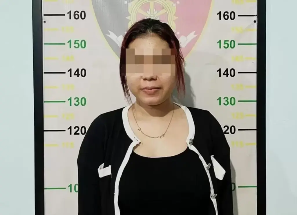 A police mugshot of the Indonesian Instagram star Nab (22).