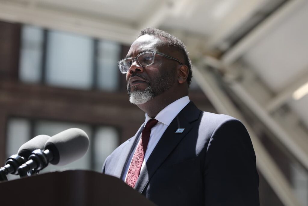 Chicago Mayor Brandon Johnson speaking at a Memorial Day event.