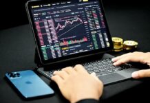 Trump Nominates Michael Selig to Lead CFTC: What It Means for Sports Prediction Markets Person using laptop showing a cryptocurrency trading dashboard