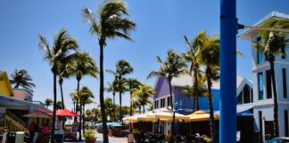 Latest Raids in Fort Myers Spotlight the Persistence of Florida’s Illegal Gambling Trade Colorful restaurants and palm trees in Fort Myers, Florida, on a sunny day