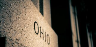 Close-up of a granite monument engraved with the word “Ohio.”