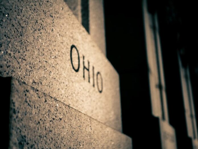 Close-up of a granite monument engraved with the word “Ohio.”