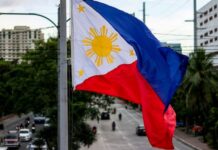 Philippines flag flying in Manila.