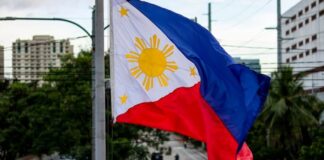 Evolution’s Philippines Partner Loses License, Live Studio Reportedly Safe Amid Rising Regulatory Heat Philippines flag flying in Manila.