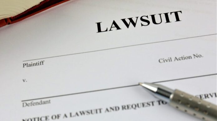 Federal Lawsuit Claims Michigan’s Gambling Self-Exclusion Program Violates Constitutional Rights Lawsuit paperwork with a pen